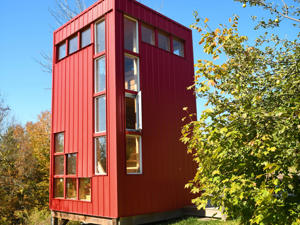  Sheree Rasmussen repurposed an artist's studio that her late partner built into a tiny home rental. She wanted to honor his life by letting others enjoy the space while making money on Airbnb. The 70-year-old now earns about $2,200 a month renting out the bright red tower that's 18 feet high. Two years after Sheree Rasmussen's partner passed away, she decided to repurpose an artist studio he'd built into a tiny home to rent out on Airbnb.The 70-year-old textile artist wanted to honor Clive Russell's life and work by sharing the Red Tower with others, so she turned it into a rental property in 2018.The couple purchased 30 acres of rural land in a small town called Castleton in Ontario, Canada, about 15 years ago, and Russell built the studio for them to work in. "When Clive passed away I pondered over what to do with it because it is such a unique building," Rasmussen told Insider. "I thought 'why not rent it out?' because it would be a beautiful way for me to share his work and land."Rasmussen said it mainly appeals to young people from Toronto, which is about two hours away, who want to spend a few nights seeing the stars, building a campfire, and enjoying nature.Now she rents it out for about C$150 ($112) a night. Read the original article on Business Insider