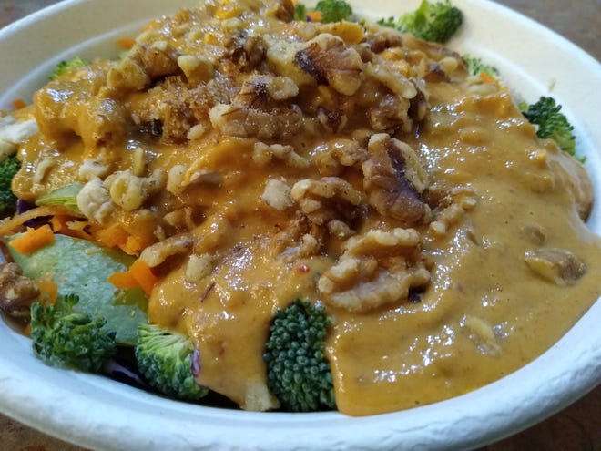 The Peanut Thai Rice Bowl at Fresh Planet in Tallmadge features oven-roasted chicken, snow peas, carrots, peppers, broccoli, red cabbage and walnuts smothered in a peanut sauce.