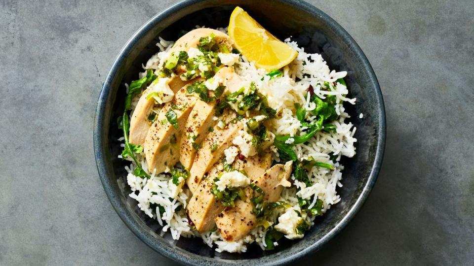 chicken and rice with feta and mint in a bowl
