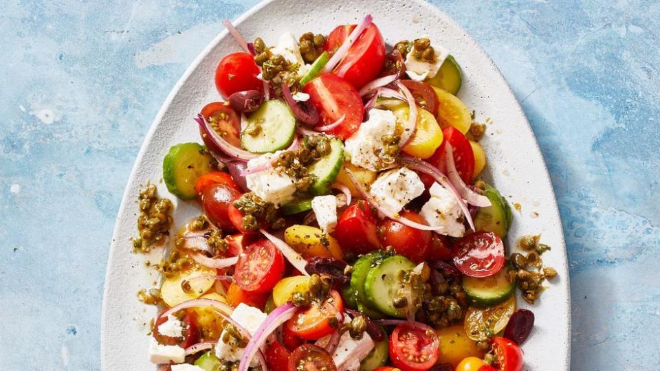 greek salad with tomato, red onion, feta, cucumber and capers