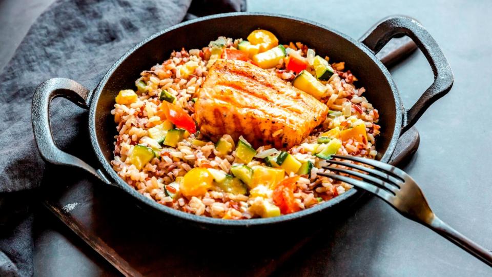 PHOTO: Stock photo of roasted salmon over rice with vegetables. (STOCK PHOTO/Getty Images)