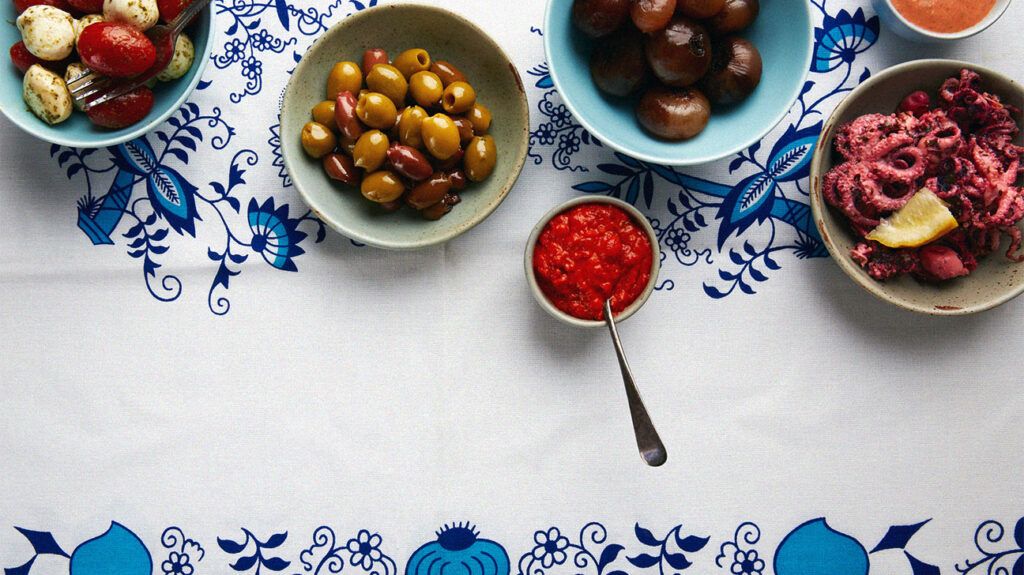 Overhead view of olives and antipasti