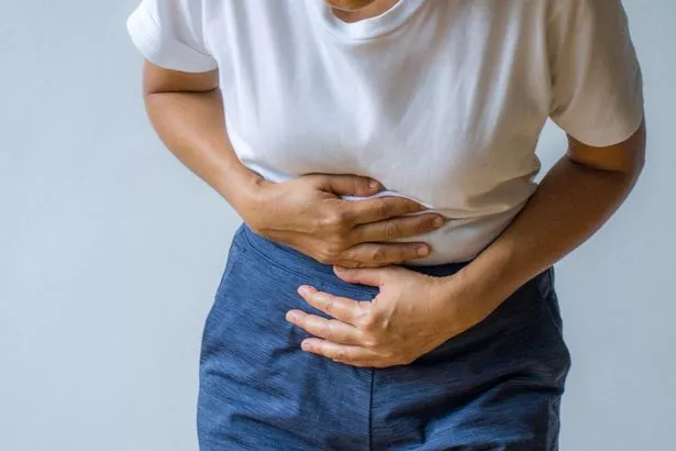 A woman with stomach pain