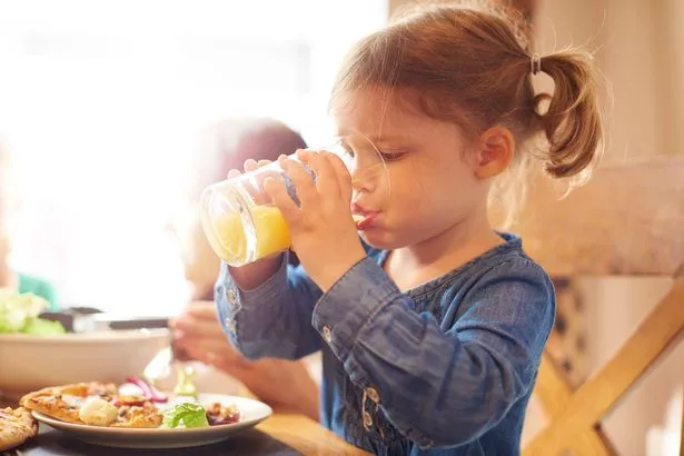 Girl drinking juice