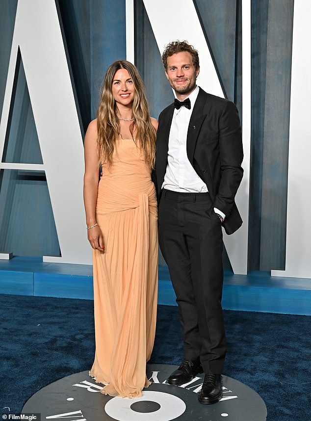 Jamie - who's been married to Amelia Warner for 11 years - said Diet Coke is the best 'in the morning after a sport,' to much laughter from the audience (pictured with Amelia in 2022)