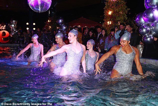 Guests were treated to a performance by synchronised swimmers on the rooftop