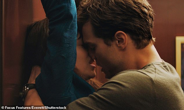 Jamie is pictured with Dakota Johnson in Fifty Shades of Grey