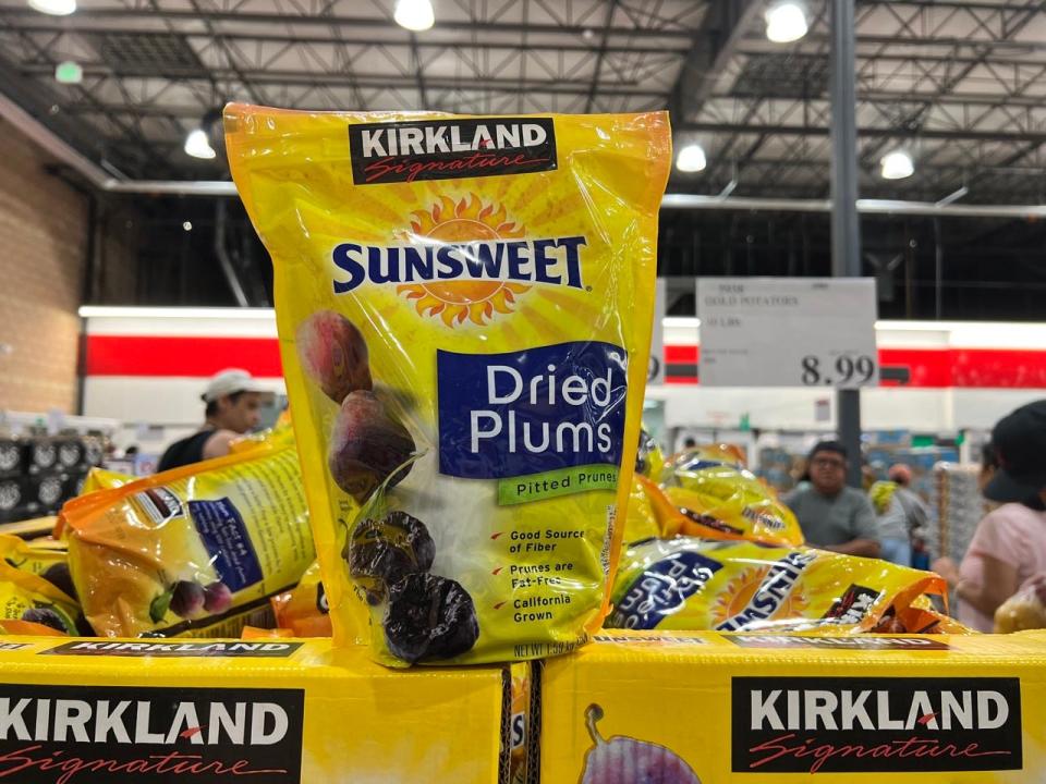 Kirkland Dried pums bag on top of display at Costco