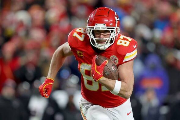 Travis Kelce running in a game